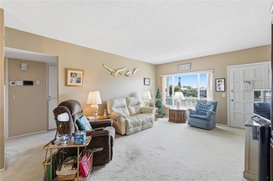 Welcome to this light and bright two-bedroom, two-bathroom condo on On Top Of The World Golf Course in Florida - for sale on GolfHomes.com, golf home, golf lot