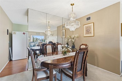 Welcome to this light and bright two-bedroom, two-bathroom condo on On Top Of The World Golf Course in Florida - for sale on GolfHomes.com, golf home, golf lot