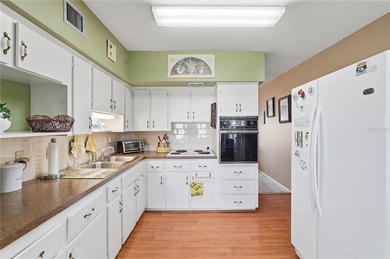 Welcome to this light and bright two-bedroom, two-bathroom condo on On Top Of The World Golf Course in Florida - for sale on GolfHomes.com, golf home, golf lot