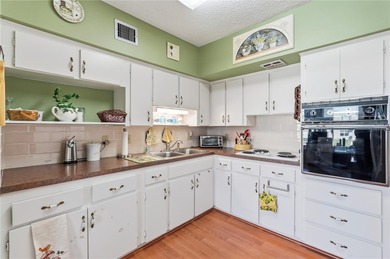 Welcome to this light and bright two-bedroom, two-bathroom condo on On Top Of The World Golf Course in Florida - for sale on GolfHomes.com, golf home, golf lot