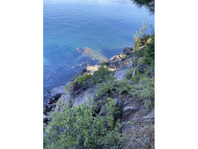 This property has spectacular deep water lake frontage. Enjoy on Lake Almanor Country Club in California - for sale on GolfHomes.com, golf home, golf lot