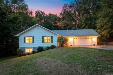 This well-cared-for 3-bedroom, 3-bath home offers comfort and on Cherokee Village North Course in Arkansas - for sale on GolfHomes.com, golf home, golf lot