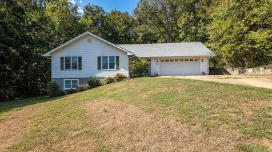 This well-cared-for 3-bedroom, 3-bath home offers comfort and on Cherokee Village North Course in Arkansas - for sale on GolfHomes.com, golf home, golf lot