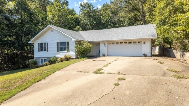 This well-cared-for 3-bedroom, 3-bath home offers comfort and on Cherokee Village North Course in Arkansas - for sale on GolfHomes.com, golf home, golf lot