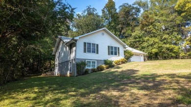 This well-cared-for 3-bedroom, 3-bath home offers comfort and on Cherokee Village North Course in Arkansas - for sale on GolfHomes.com, golf home, golf lot