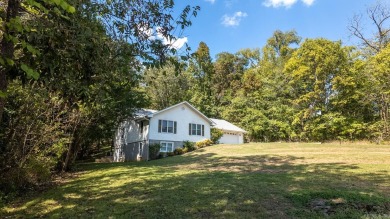 This well-cared-for 3-bedroom, 3-bath home offers comfort and on Cherokee Village North Course in Arkansas - for sale on GolfHomes.com, golf home, golf lot