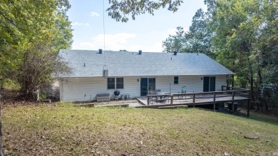 This well-cared-for 3-bedroom, 3-bath home offers comfort and on Cherokee Village North Course in Arkansas - for sale on GolfHomes.com, golf home, golf lot