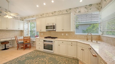 Welcome to this move-in ready home, with a spectacular water on University Park Country Club in Florida - for sale on GolfHomes.com, golf home, golf lot