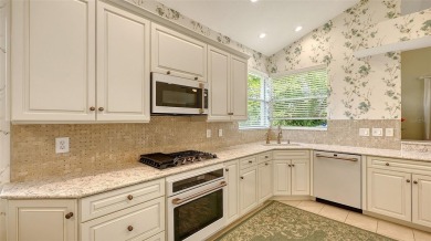 Welcome to this move-in ready home, with a spectacular water on University Park Country Club in Florida - for sale on GolfHomes.com, golf home, golf lot
