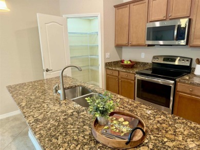 THIS HOME OFFERS AN IDEAL BLEND OF MODERN COMFORT AND ELEGANT on Heron Creek Golf and Country Club in Florida - for sale on GolfHomes.com, golf home, golf lot