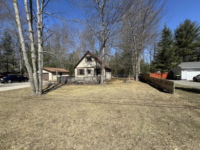 This charming home offers a tranquil retreat just half a mile on Birch Pointe Golf Club in Michigan - for sale on GolfHomes.com, golf home, golf lot