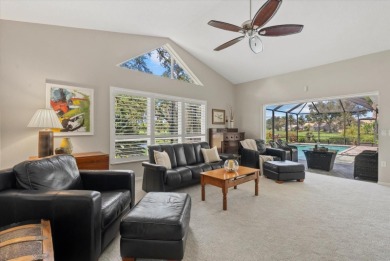 Enjoy stunning lake and golf course views framed by mature trees on Waterford Golf Club in Florida - for sale on GolfHomes.com, golf home, golf lot