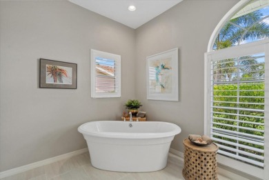 Enjoy stunning lake and golf course views framed by mature trees on Waterford Golf Club in Florida - for sale on GolfHomes.com, golf home, golf lot