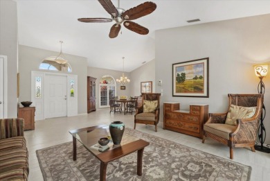 Enjoy stunning lake and golf course views framed by mature trees on Waterford Golf Club in Florida - for sale on GolfHomes.com, golf home, golf lot