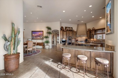 Positioned along the 14th hole tee box within the guard-gated on Troon North Golf Club  in Arizona - for sale on GolfHomes.com, golf home, golf lot