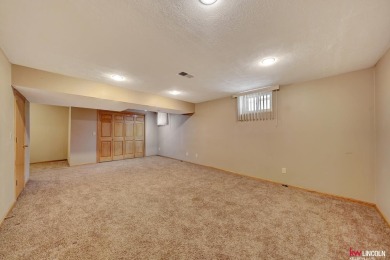 This beautiful Highlands 2-story, former Parade Home and has so on Highlands Golf Course in Nebraska - for sale on GolfHomes.com, golf home, golf lot