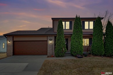 This beautiful Highlands 2-story, former Parade Home and has so on Highlands Golf Course in Nebraska - for sale on GolfHomes.com, golf home, golf lot