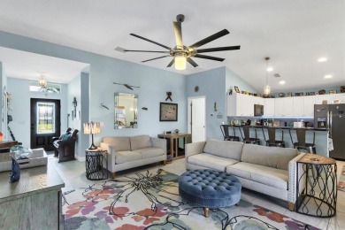 Designed to capture the best of its coastal locale, this on Pinemoor West Golf Club in Florida - for sale on GolfHomes.com, golf home, golf lot