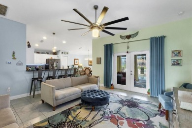 Designed to capture the best of its coastal locale, this on Pinemoor West Golf Club in Florida - for sale on GolfHomes.com, golf home, golf lot