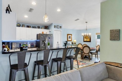 Designed to capture the best of its coastal locale, this on Pinemoor West Golf Club in Florida - for sale on GolfHomes.com, golf home, golf lot