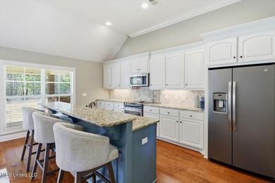 This thoughtfully designed home features quality construction on Patrick Farms Golf Club in Mississippi - for sale on GolfHomes.com, golf home, golf lot