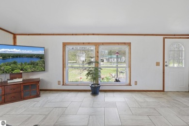 This 3-bedroom, 2-bath home in Kalkaska's Drydock community on Twin Birch Golf Club in Michigan - for sale on GolfHomes.com, golf home, golf lot