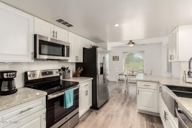 Start creating lasting memories in this charming end-unit on Painted Mountain Golf Club in Arizona - for sale on GolfHomes.com, golf home, golf lot