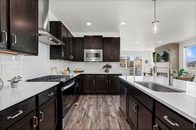 Backing to open space with incredible views! This newer on Southridge Golf Club in Colorado - for sale on GolfHomes.com, golf home, golf lot