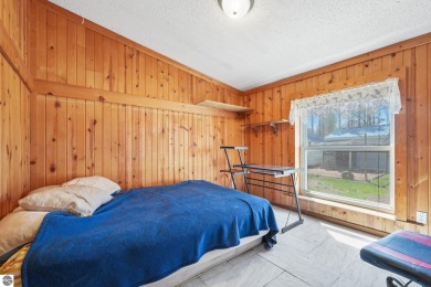 This 3-bedroom, 2-bath home in Kalkaska's Drydock community on Twin Birch Golf Club in Michigan - for sale on GolfHomes.com, golf home, golf lot