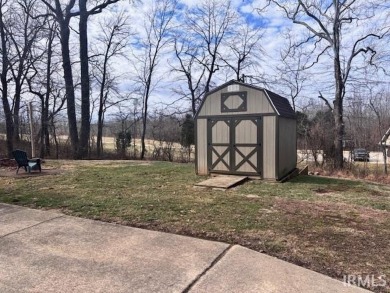 Welcome to your dream home! This immaculate property boasts on Christmas Lake Golf Course in Indiana - for sale on GolfHomes.com, golf home, golf lot