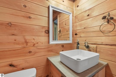 This 3-bedroom, 2-bath home in Kalkaska's Drydock community on Twin Birch Golf Club in Michigan - for sale on GolfHomes.com, golf home, golf lot