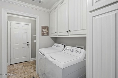 This thoughtfully designed home features quality construction on Patrick Farms Golf Club in Mississippi - for sale on GolfHomes.com, golf home, golf lot