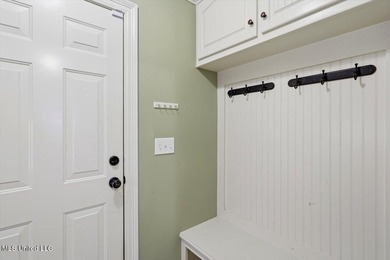 This thoughtfully designed home features quality construction on Patrick Farms Golf Club in Mississippi - for sale on GolfHomes.com, golf home, golf lot