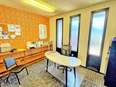 This versatile commercial property offers a unique opportunity on Perryton Municipal Golf Course in Texas - for sale on GolfHomes.com, golf home, golf lot