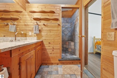 This 3-bedroom, 2-bath home in Kalkaska's Drydock community on Twin Birch Golf Club in Michigan - for sale on GolfHomes.com, golf home, golf lot