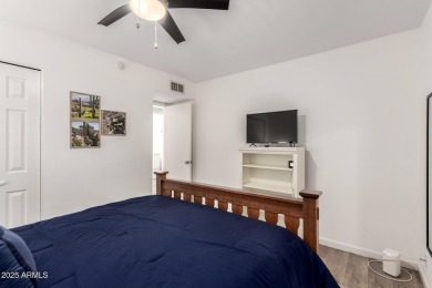 Start creating lasting memories in this charming end-unit on Painted Mountain Golf Club in Arizona - for sale on GolfHomes.com, golf home, golf lot