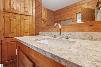 This 3-bedroom, 2-bath home in Kalkaska's Drydock community on Twin Birch Golf Club in Michigan - for sale on GolfHomes.com, golf home, golf lot
