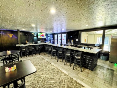 This versatile commercial property offers a unique opportunity on Perryton Municipal Golf Course in Texas - for sale on GolfHomes.com, golf home, golf lot