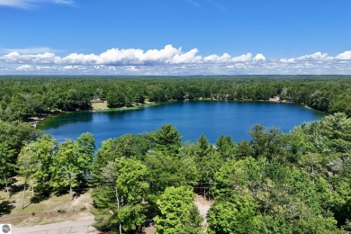 This 3-bedroom, 2-bath home in Kalkaska's Drydock community on Twin Birch Golf Club in Michigan - for sale on GolfHomes.com, golf home, golf lot