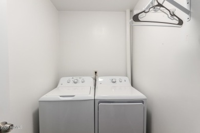 Start creating lasting memories in this charming end-unit on Painted Mountain Golf Club in Arizona - for sale on GolfHomes.com, golf home, golf lot