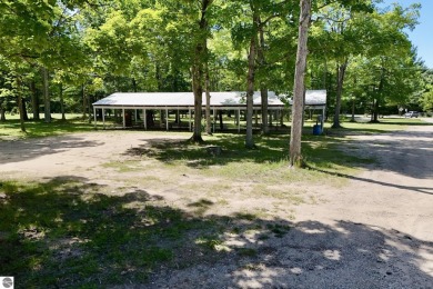 This 3-bedroom, 2-bath home in Kalkaska's Drydock community on Twin Birch Golf Club in Michigan - for sale on GolfHomes.com, golf home, golf lot