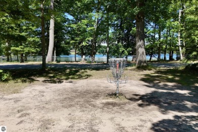 This 3-bedroom, 2-bath home in Kalkaska's Drydock community on Twin Birch Golf Club in Michigan - for sale on GolfHomes.com, golf home, golf lot