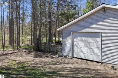 This 3-bedroom, 2-bath home in Kalkaska's Drydock community on Twin Birch Golf Club in Michigan - for sale on GolfHomes.com, golf home, golf lot