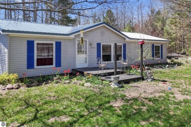This 3-bedroom, 2-bath home in Kalkaska's Drydock community on Twin Birch Golf Club in Michigan - for sale on GolfHomes.com, golf home, golf lot