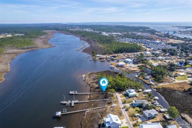 DEEP WATER ACCESS WATERFRONT LOT with DOCK and BOAT LIFT on on Perdido Bay Golf Club in Florida - for sale on GolfHomes.com, golf home, golf lot
