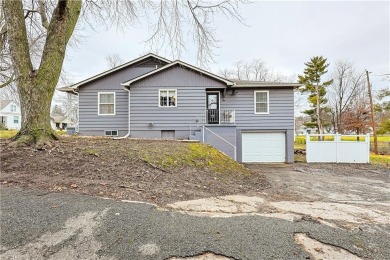 You need to see this lovely raised ranch! Features; all white on Moila Country Club in Missouri - for sale on GolfHomes.com, golf home, golf lot