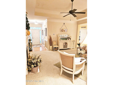 This you chance to own a well maintained home in the heart of on Sea Trail Golf Resort in North Carolina - for sale on GolfHomes.com, golf home, golf lot