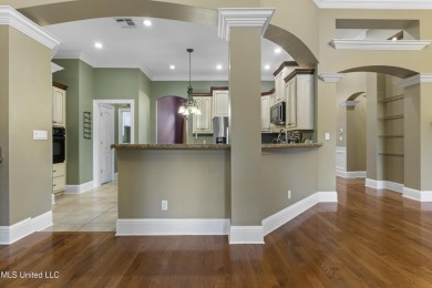 Welcome to this stunning custom-built 4-bedroom, 2.5-bath home on Diamondhead Country Club in Mississippi - for sale on GolfHomes.com, golf home, golf lot