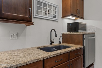 Step into this beautifully updated brick home tucked away in a on Harbour Point Golf Club in North Carolina - for sale on GolfHomes.com, golf home, golf lot