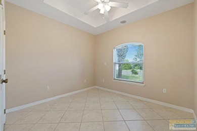Step into comfort and style in this inviting golf course home on South Padre Island Golf Club in Texas - for sale on GolfHomes.com, golf home, golf lot
